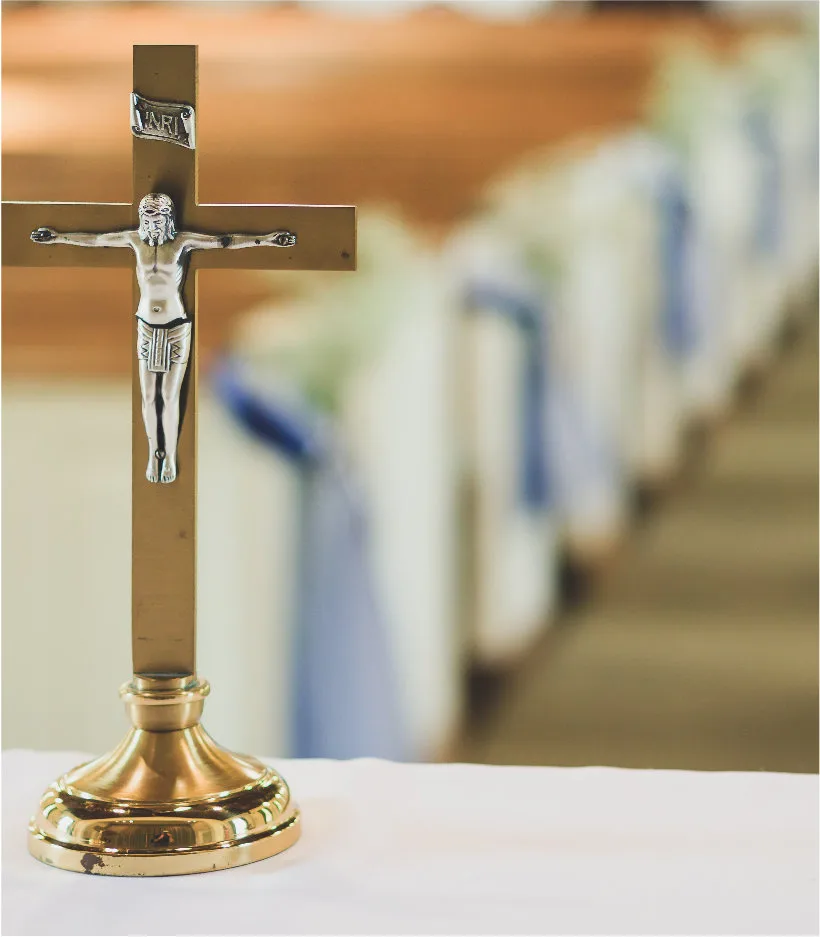An open Bible resting on a wooden table