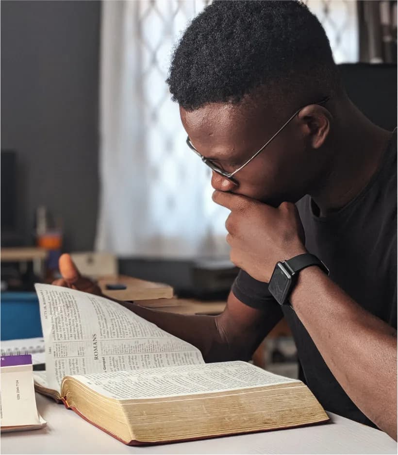 A man reading from the Holy Bible
